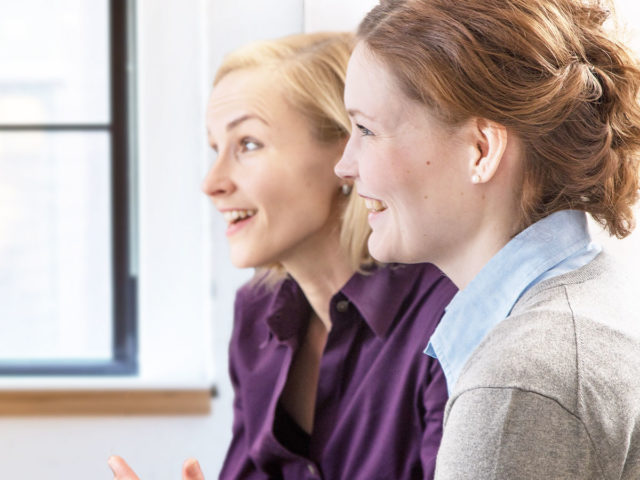 Two women talking